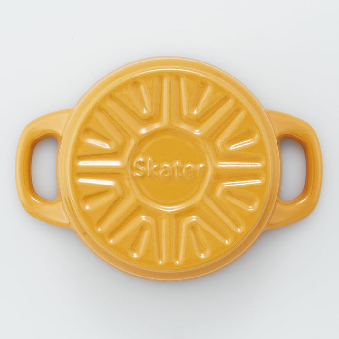 https://cdn.shopify.com/s/files/1/0564/5166/1891/files/Skater-Ih-Compatible-Cocotte-Pot-Double-Handled-Pot-Oven-Cooking-Iron-Enameled-Pumpkin-Yellow-12Cm-Inct12NA-4973307623394-3.jpg?v=1753676455